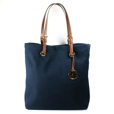 michael kors navy canvas purse|Michael Kors light blue handbag.